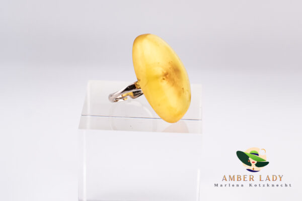 Amber ring with adjustable band.