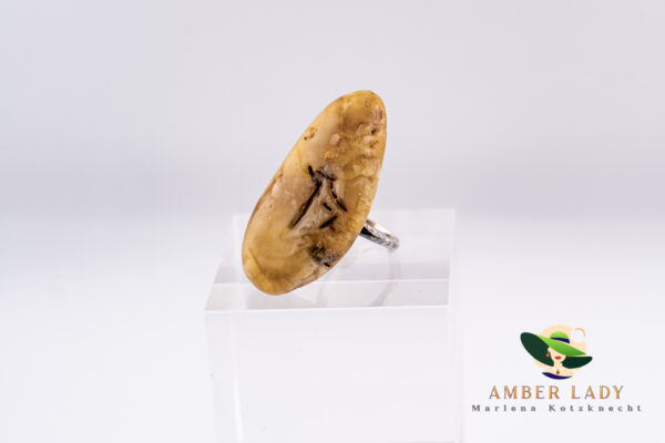 Amber ring sterling silver with adjustable band.