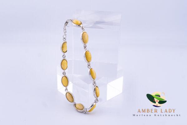 Silver bracelet with balitic amber .Total length 20,5 cm.