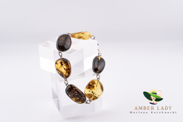 Multicolor amber bracelet with sterling silver,total length 17 cm.