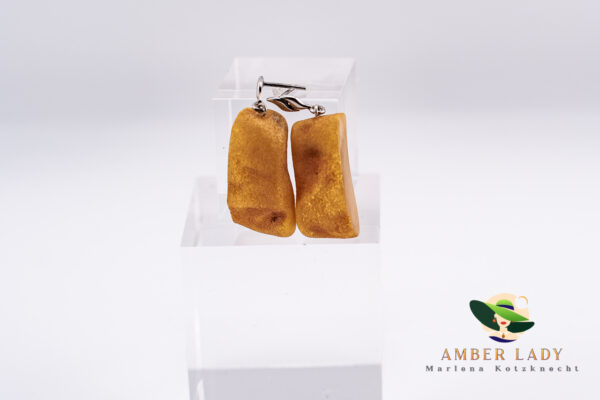 Natural amber earrings slices on sterling silver.Total length 4,5 cm.