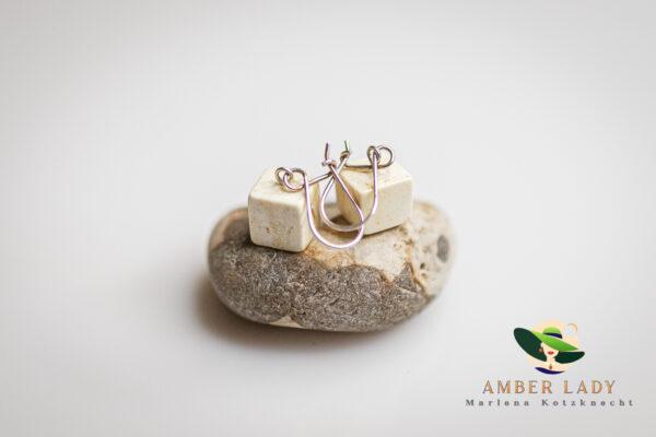 Amber earrings with sterling silver clasps.