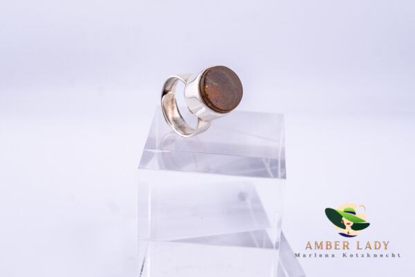 Double 925 silver ring with beautiful amber.Adjustable.