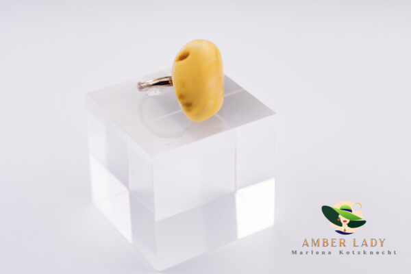 Amber ring sterling silver with adjustable band.