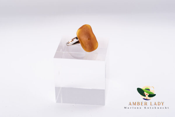 Baltic amber ring with adjustable band.