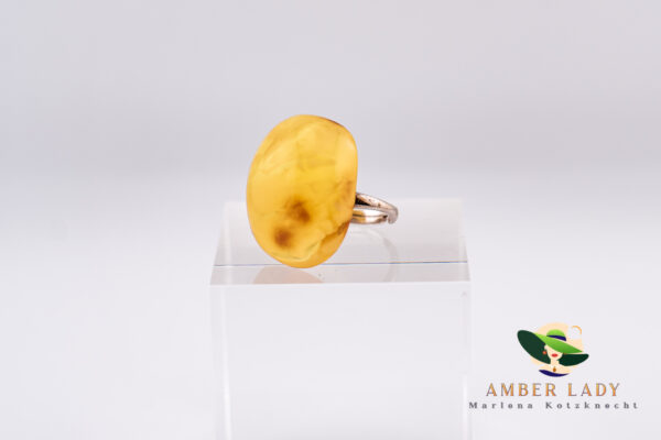 Baltic amber ring with adjustable band.